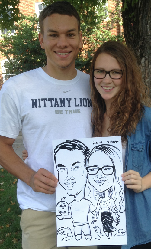 Couple caricature with pumpkin
