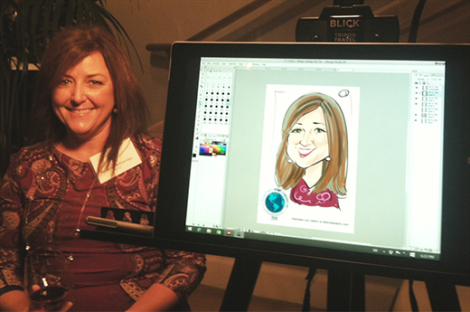 An attendee gets her caricature drawn on a Surface tablet!