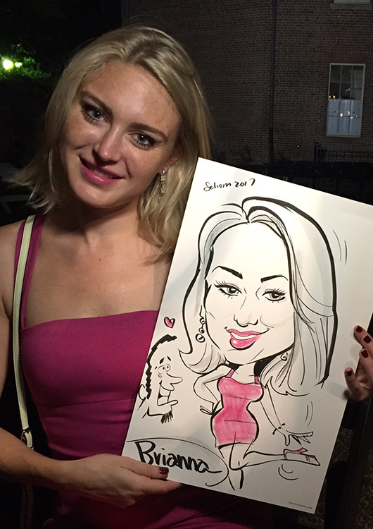young lady poses with caricature from a wedding in DC