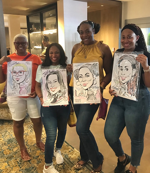 Four young ladies show off their classic caricatures drawn by SketchFacesDC